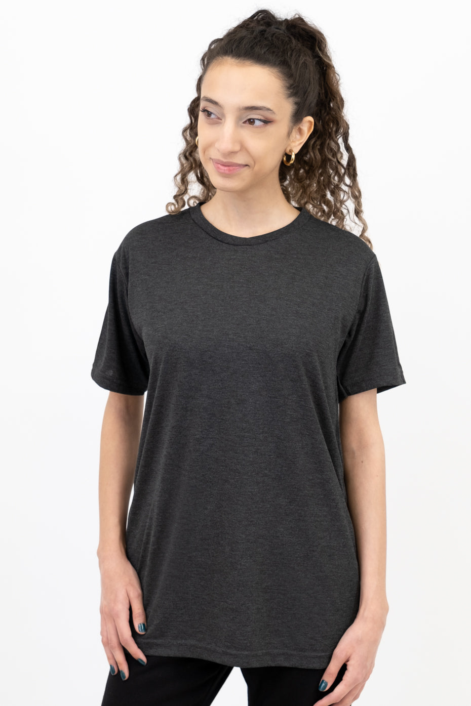 Woman wearing a black t-shirt on a white background