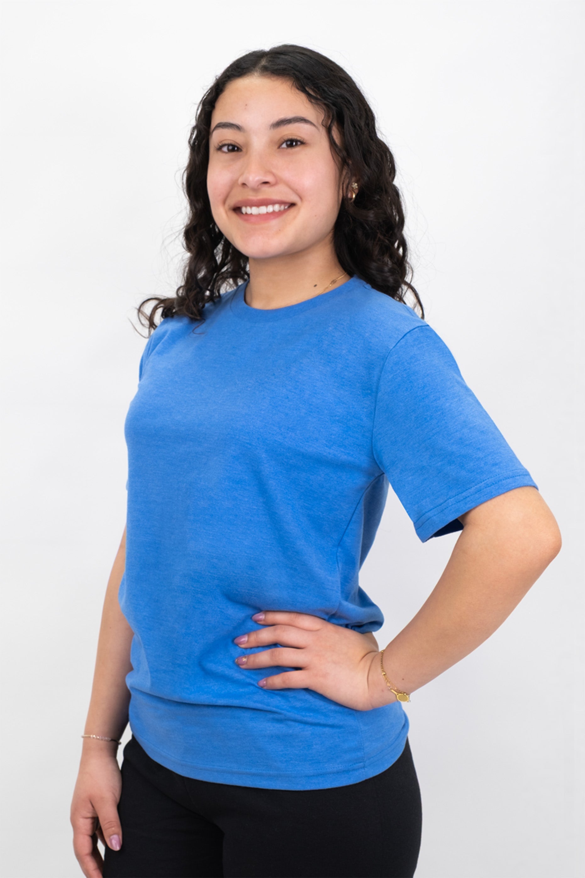 Person wearing a blue t-shirt against a white background