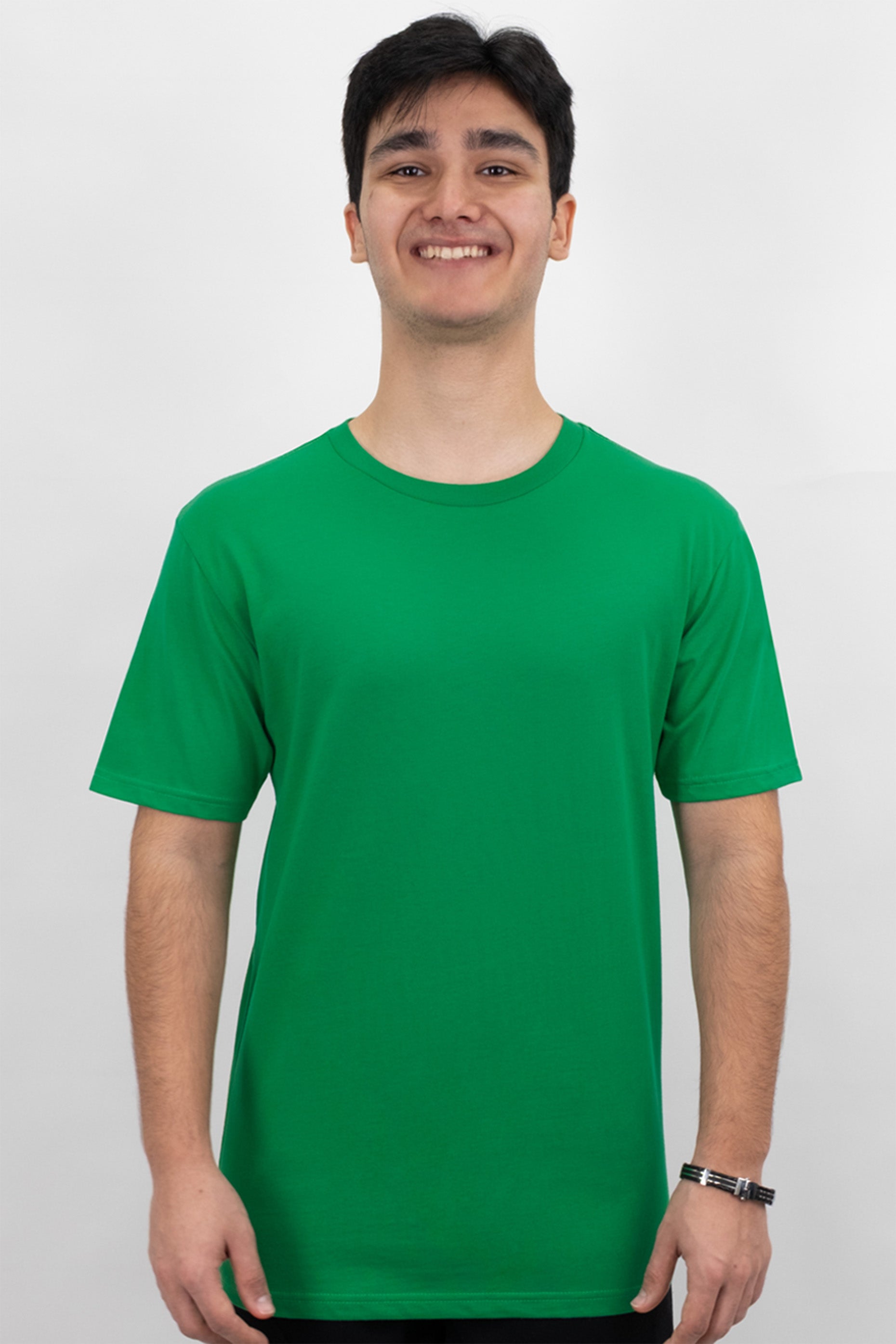 Person wearing a green t-shirt against a white background