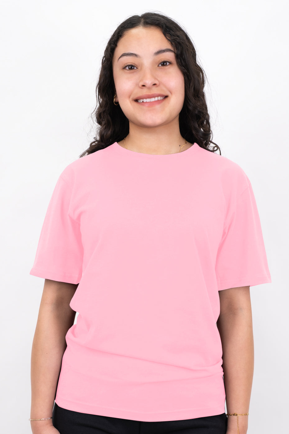 Person wearing a pink t-shirt on a white background