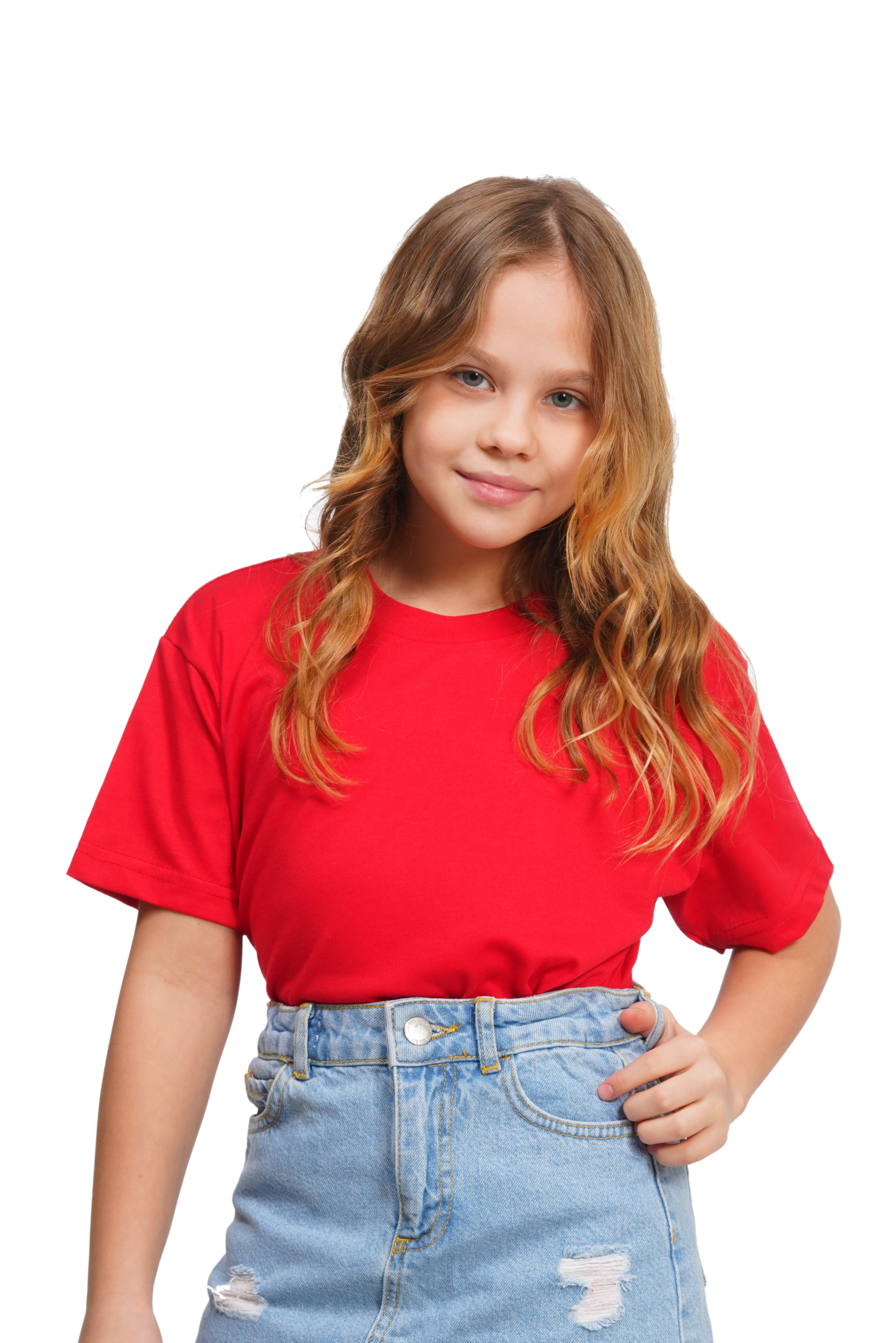 Young girl wearing a red t-shirt and blue jeans on a white background