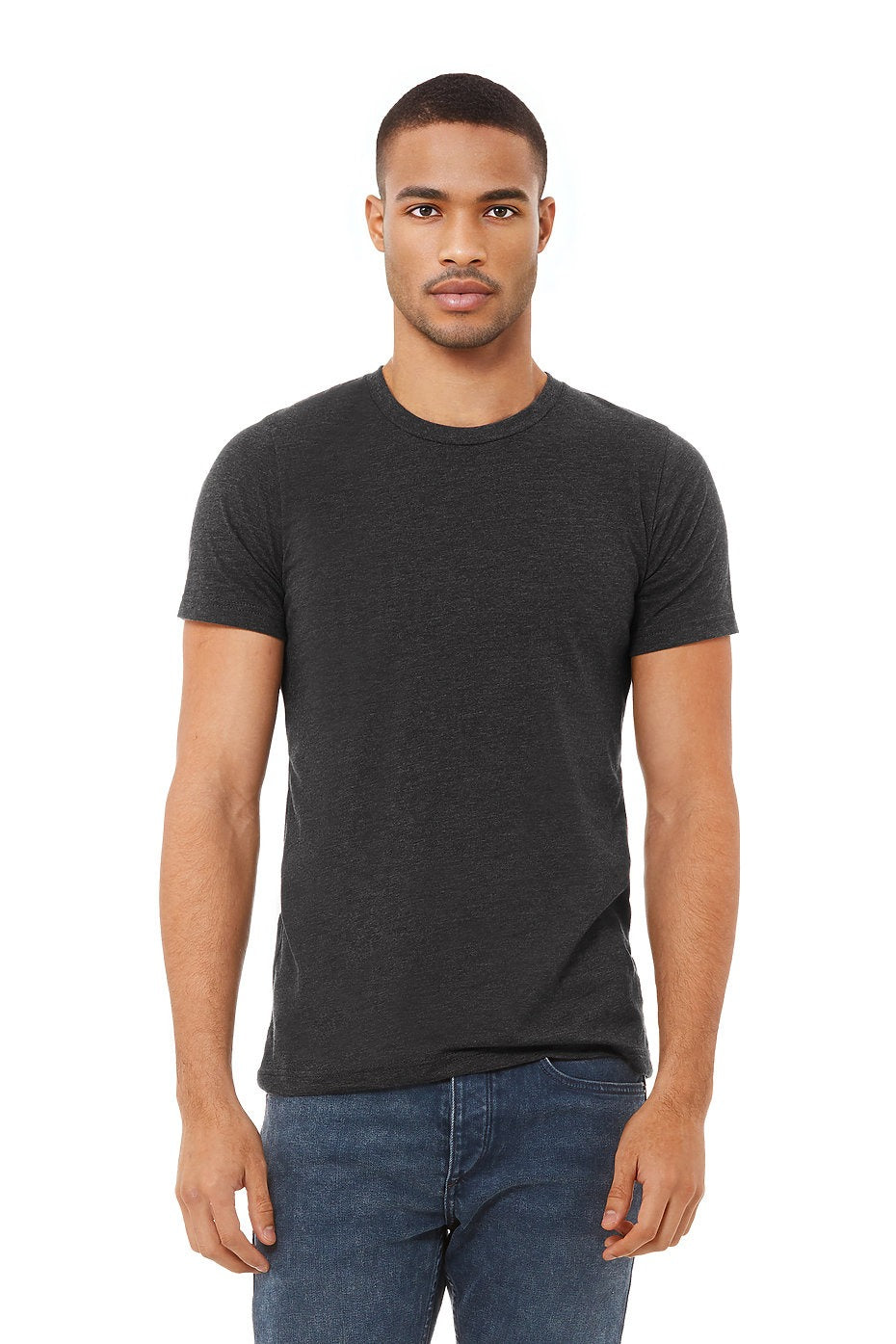 Man wearing a black t-shirt and blue jeans on a white background