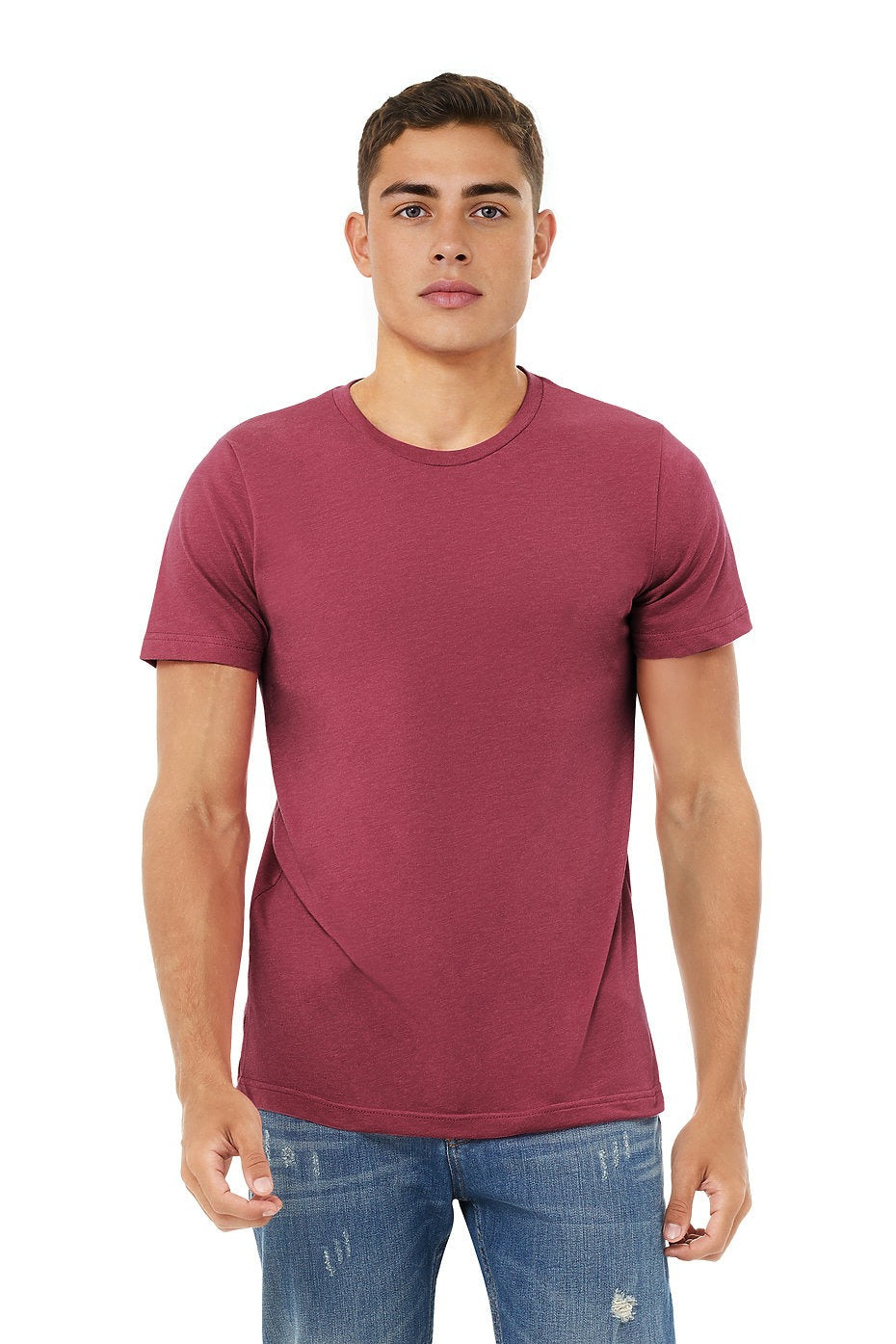 Man wearing a maroon t-shirt and blue jeans on a white background