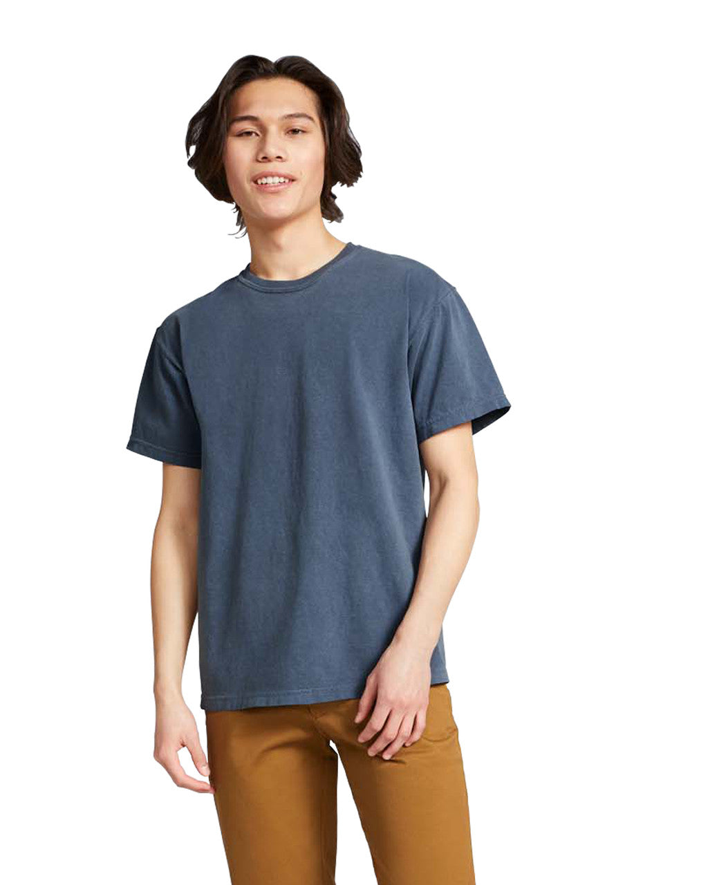 Person wearing a blue t-shirt and brown pants on a white background