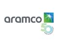 Aramco logo with a green leaf on a white background