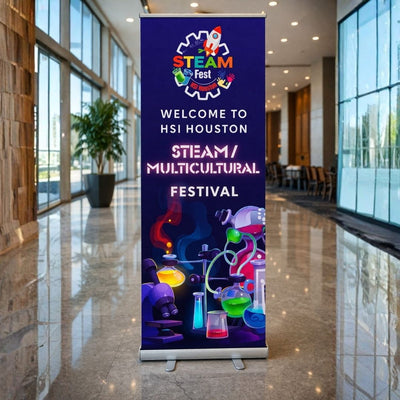 Promotional banner for a STEAM Multicultural Festival in a modern indoor setting with large windows.