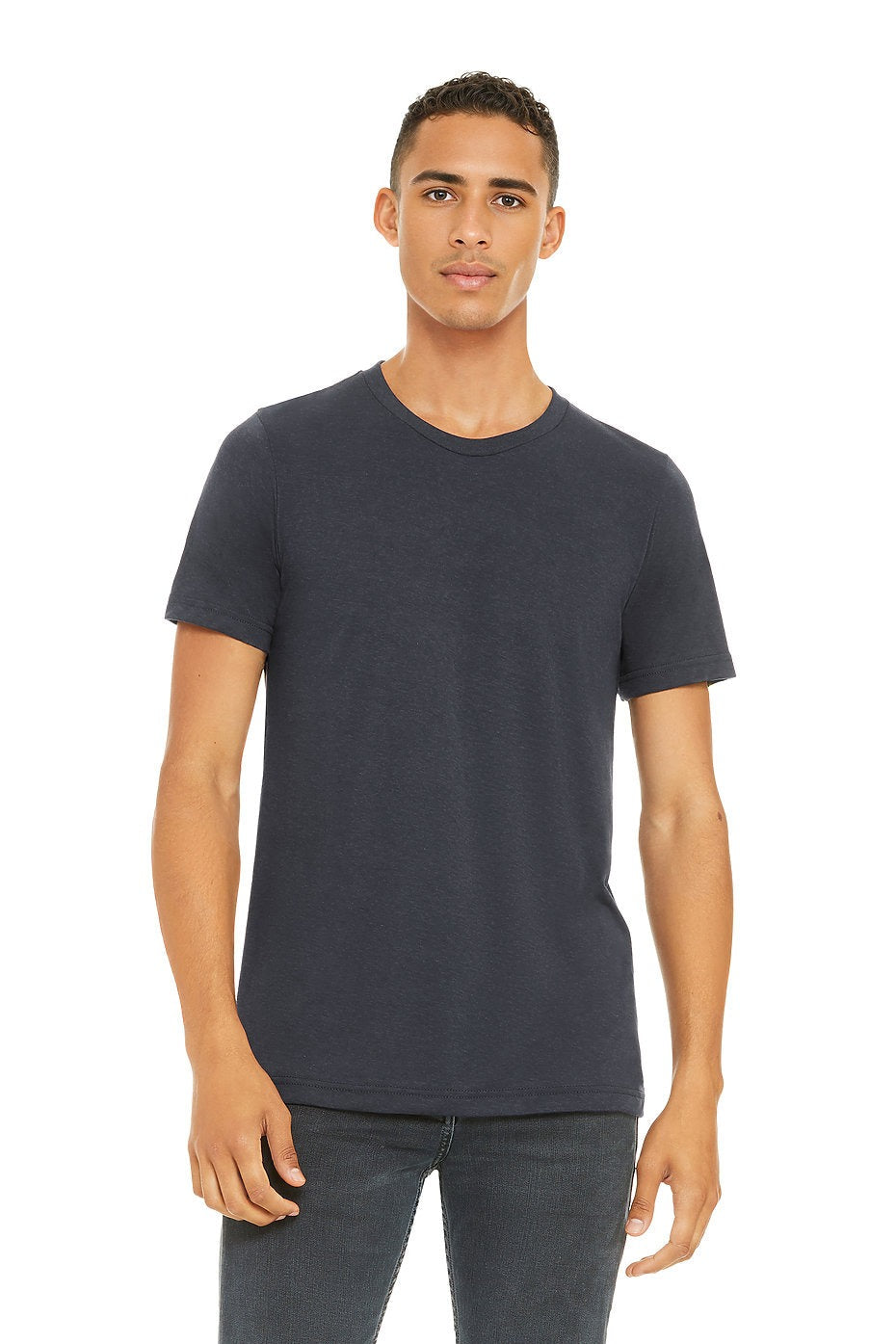 Man wearing a dark gray t-shirt and jeans on a white background