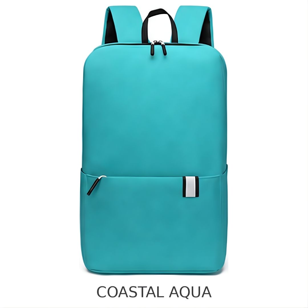 A turquoise blue backpack with black straps and zipper pulls, shown against a plain white background with the text 'COASTAL AQUA' underneath.