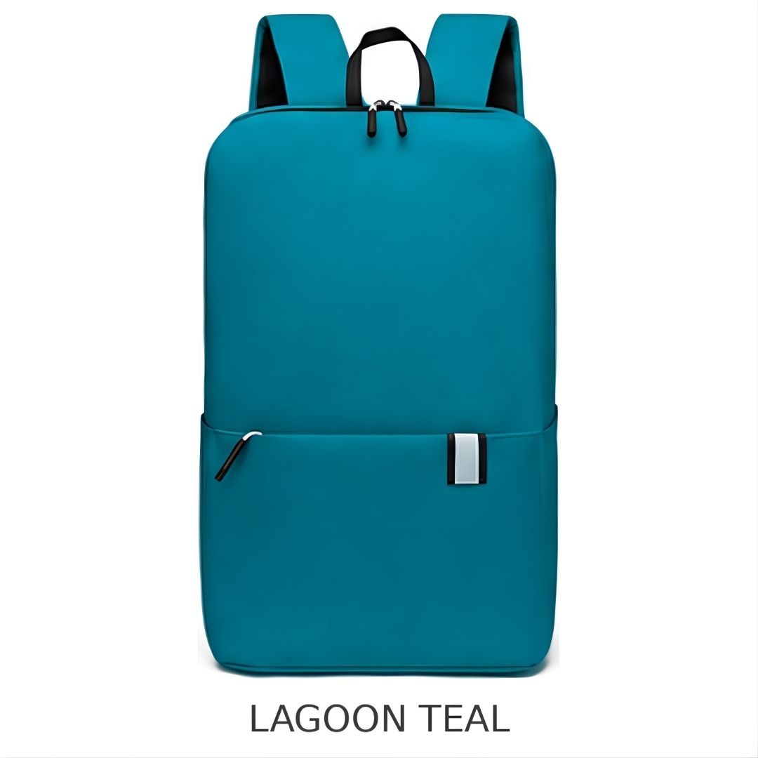 A teal backpack with black straps and zipper pulls, shown against a plain white background with the text 'LAGOON TEAL' underneath.