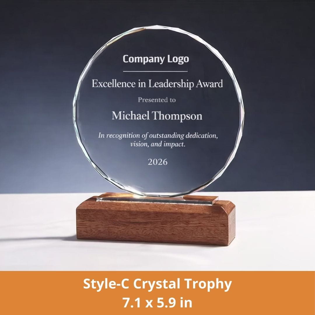 Crystal trophy with wooden base on a dark background